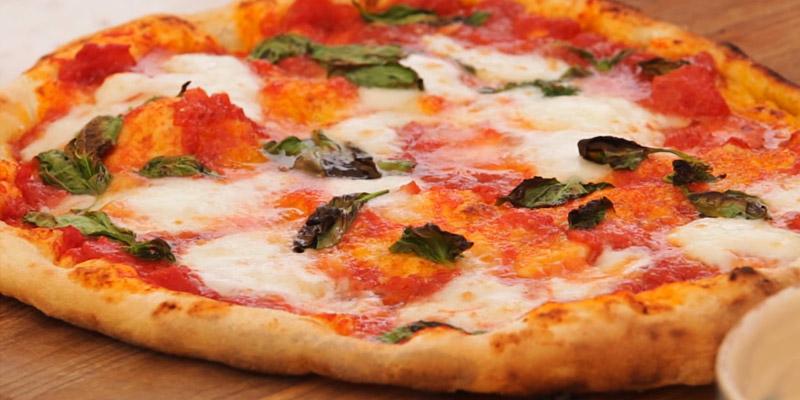 Heritage Acacia Wood Pizza Peel in the use - Bestadvisor