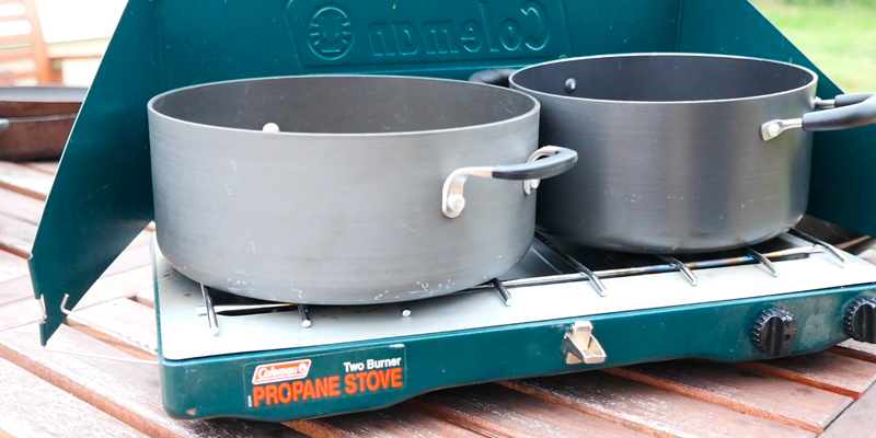 Coleman Classic Propane Stove Portable Propane Gas Classic Camp Stove with 2 Burners in the use - Bestadvisor