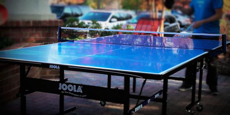 JOOLA Inside Table Tennis Table with Net Set in the use - Bestadvisor