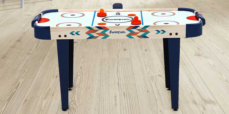 Harvil 4' Air Hockey Table with Electronic Scorer in the use - Bestadvisor
