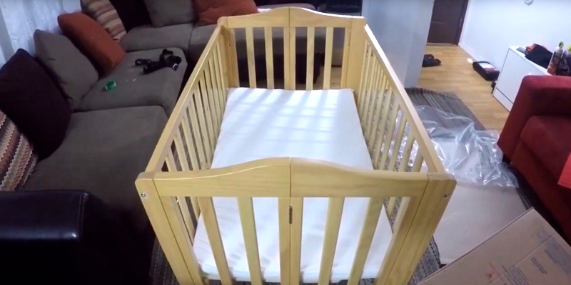 Delta Children Portable Mini Crib in the use - Bestadvisor