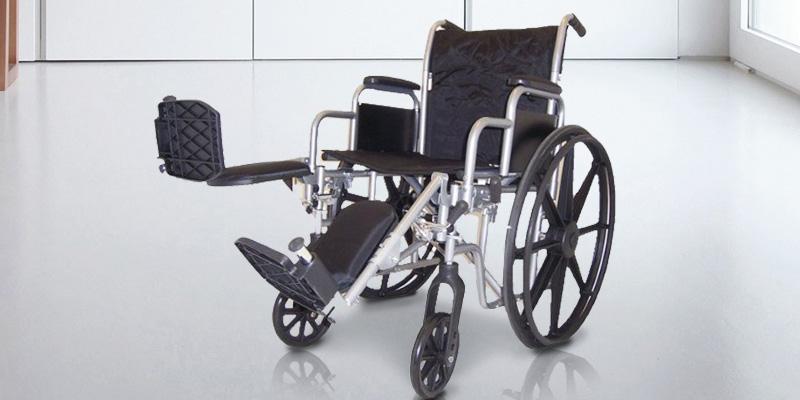 MedMobile PT8112 Self Transport Folding Wheelchair with Footrests in the use - Bestadvisor