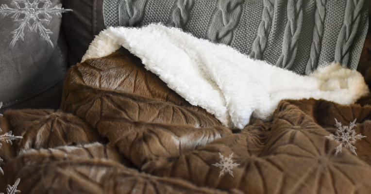 A cozy brown Sherpa blanket