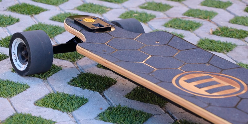 Evolve Skateboards Bamboo GTX Street Electric Skateboard in the use