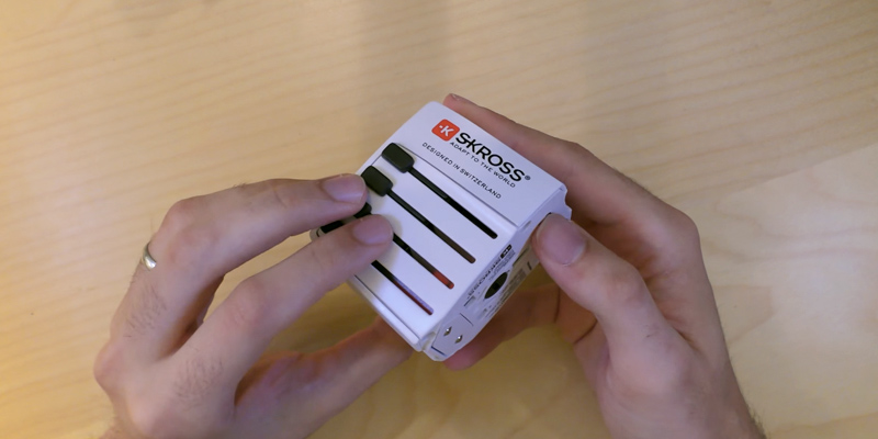 SKROSS Universal Travel Adapter in the use