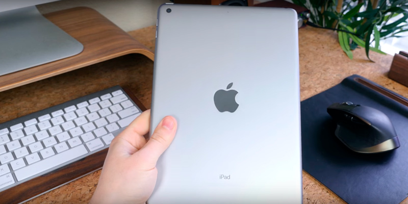 Apple iPad (MPGT2LL/A) WiFi Tablet (2017 Model) in the use